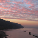 Giochi di nuvole e colori al tramonto in Baia Flaminia