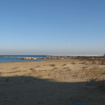 Spiaggia e porto dalla Baia Flaminia