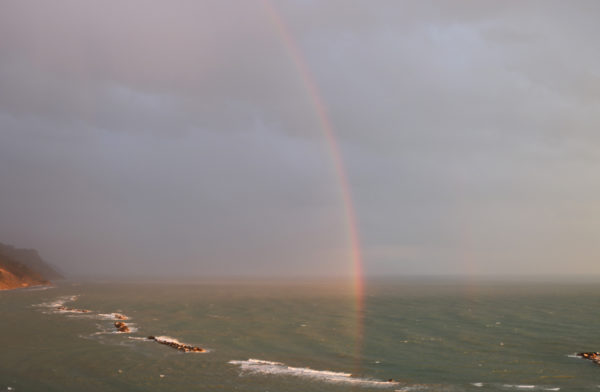 Arcobaleno all'alba in Baia Flaminia