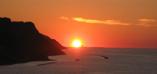 Sole su Rimini al tramonto visto da Baia Flaminia